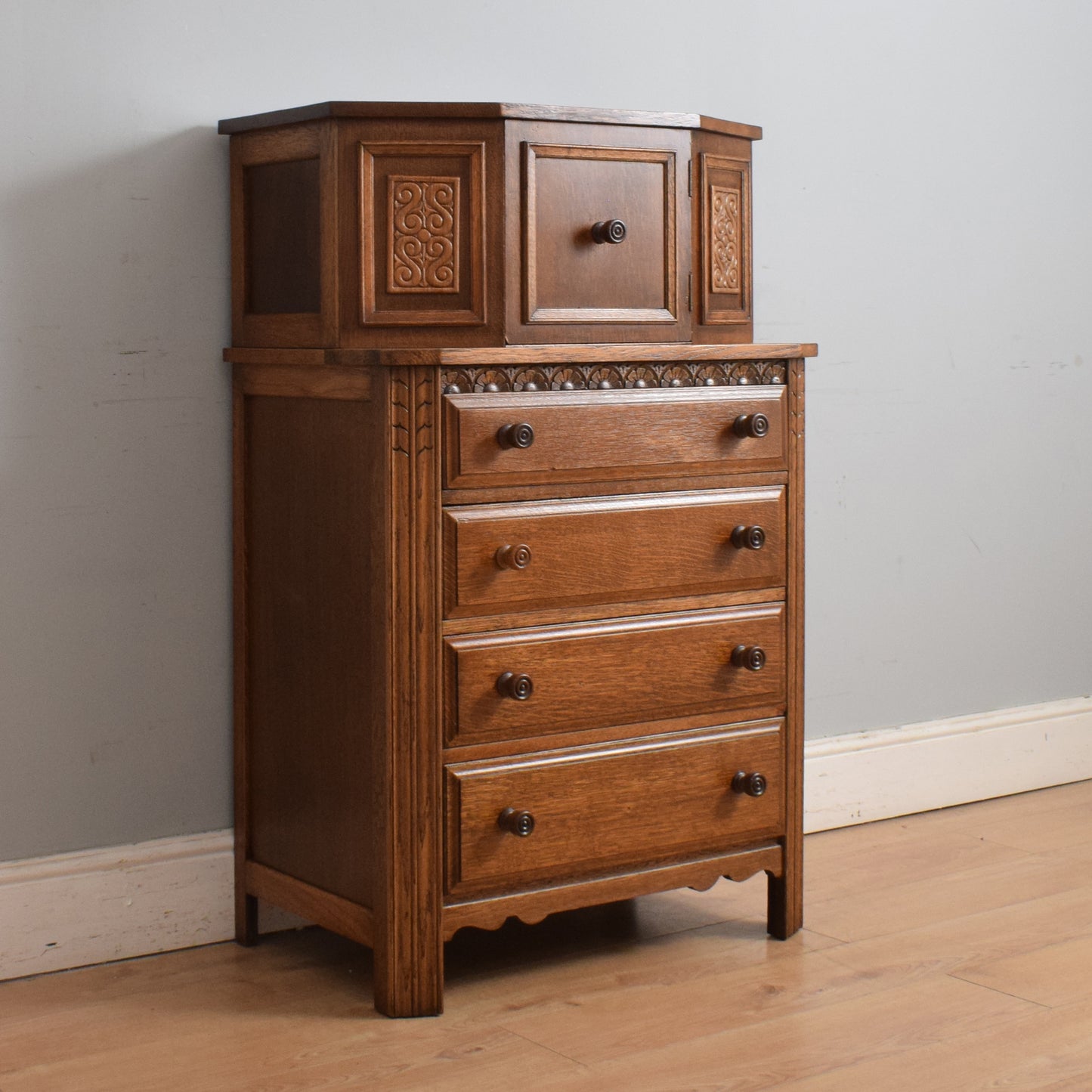 Tall Carved Chest of Drawers