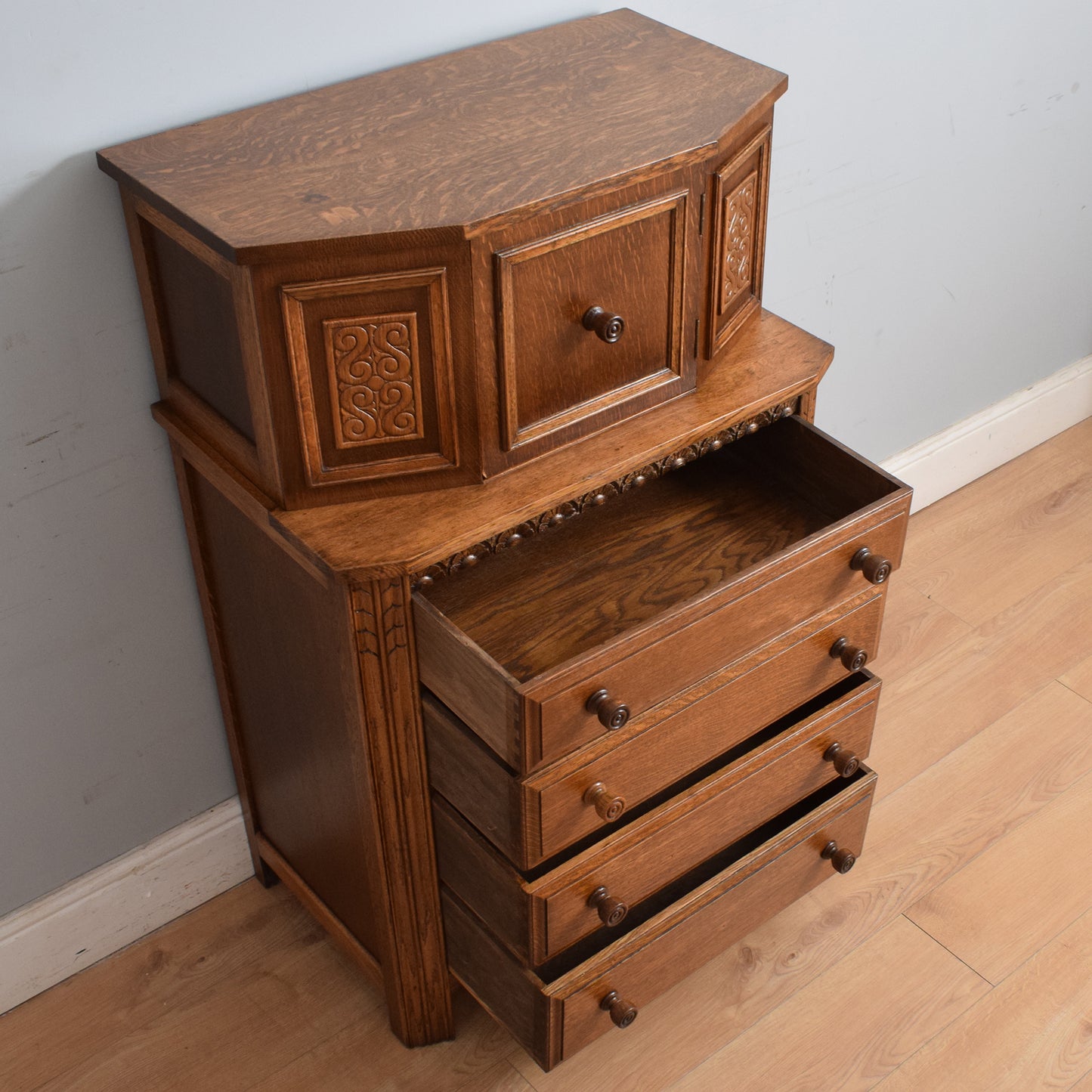 Tall Carved Chest of Drawers
