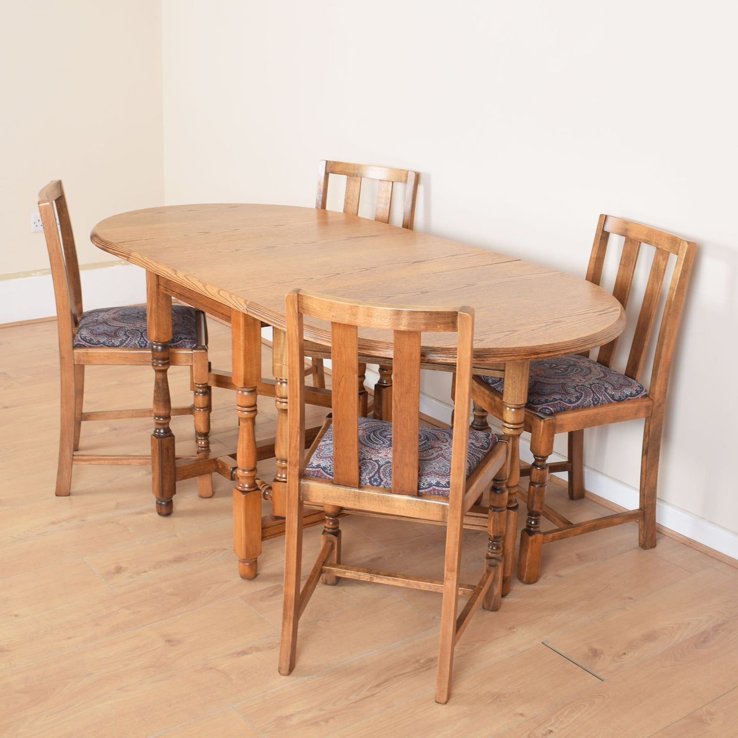 Oak Drop-Leaf Table with Four Chairs