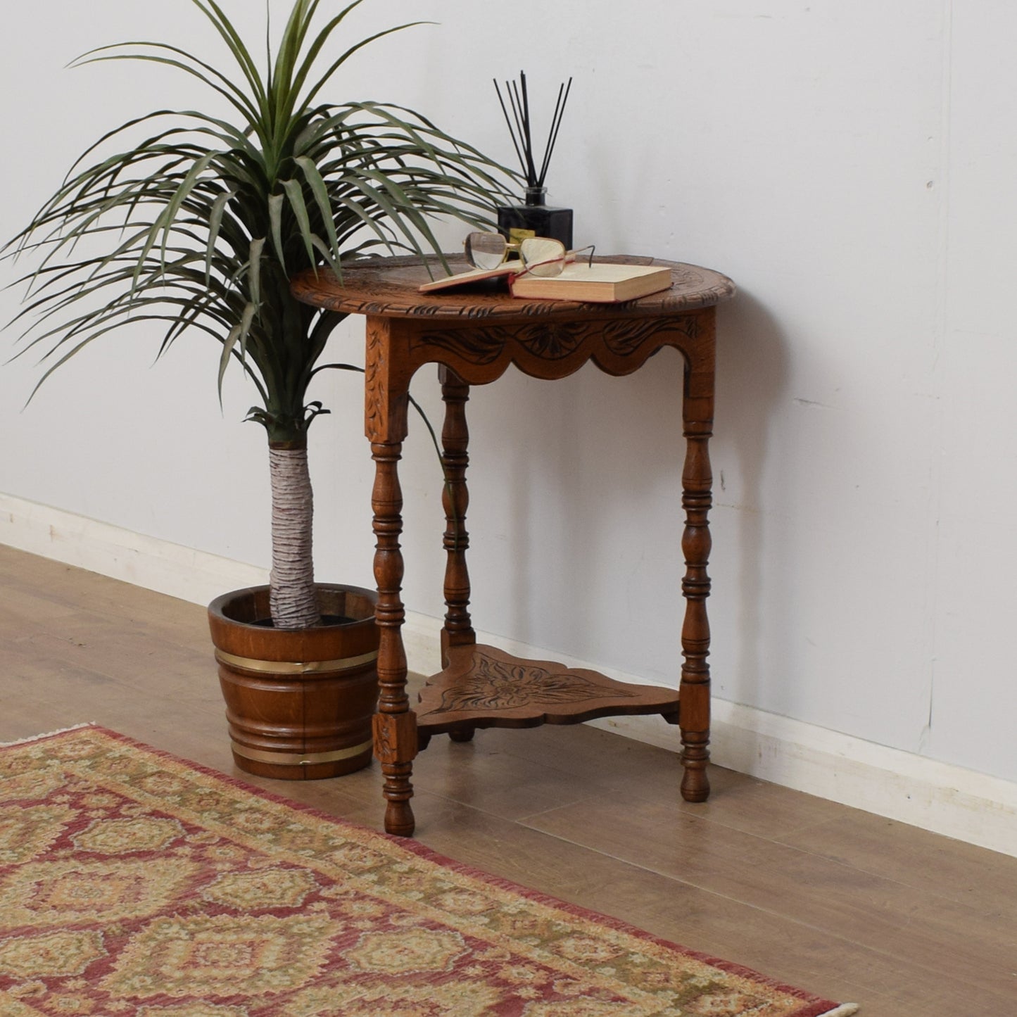Carved Swivel-Top Side Table