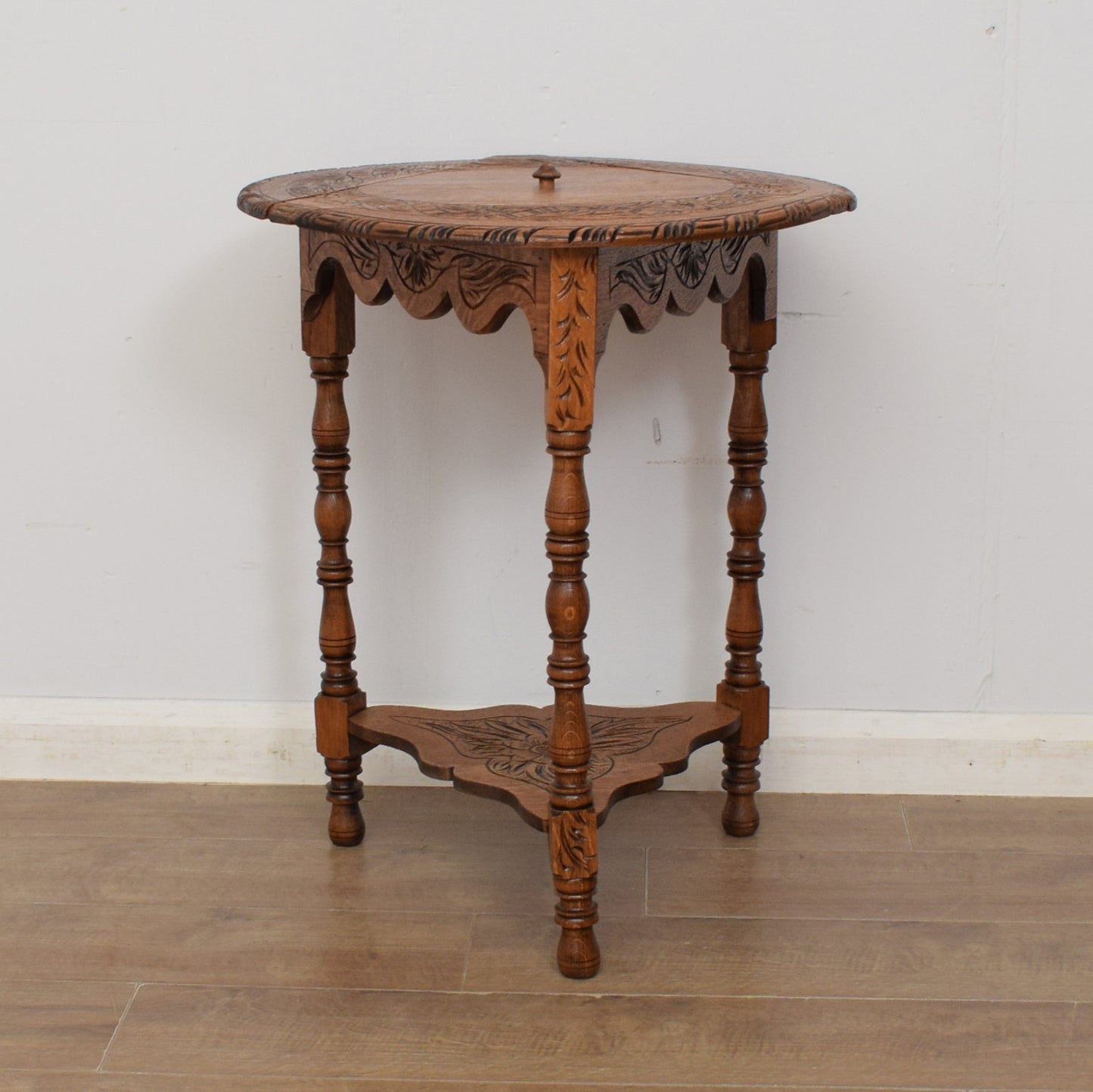 Carved Swivel-Top Side Table