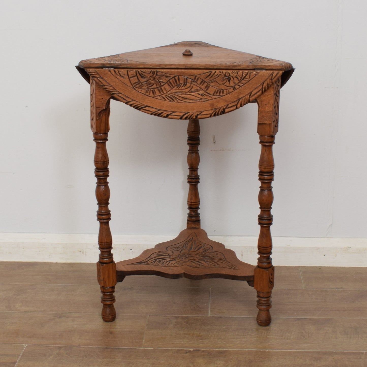 Carved Swivel-Top Side Table
