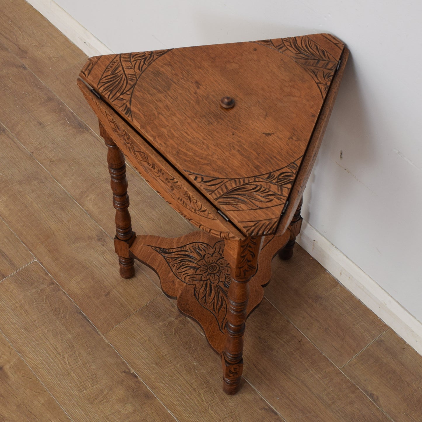 Carved Swivel-Top Side Table