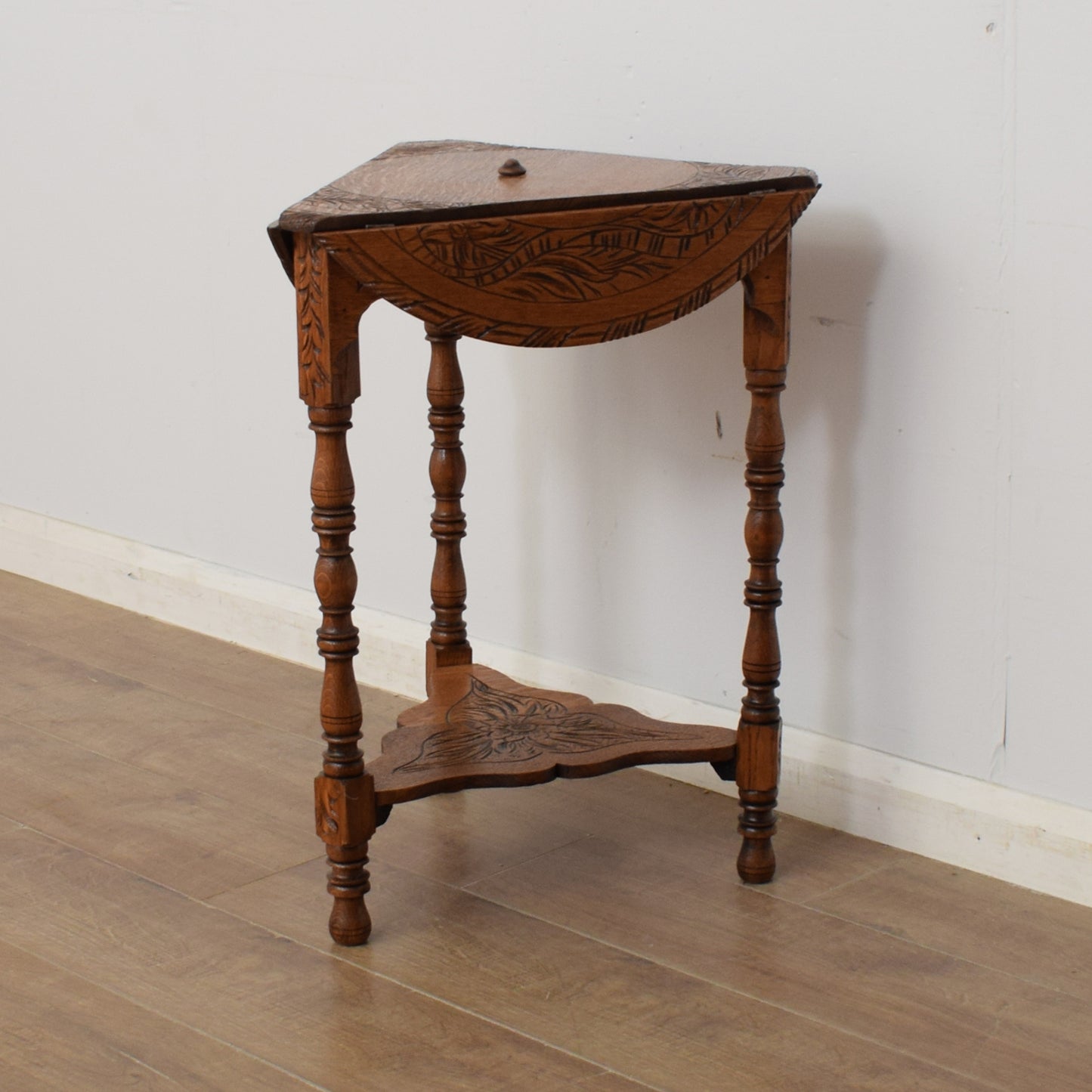 Carved Swivel-Top Side Table