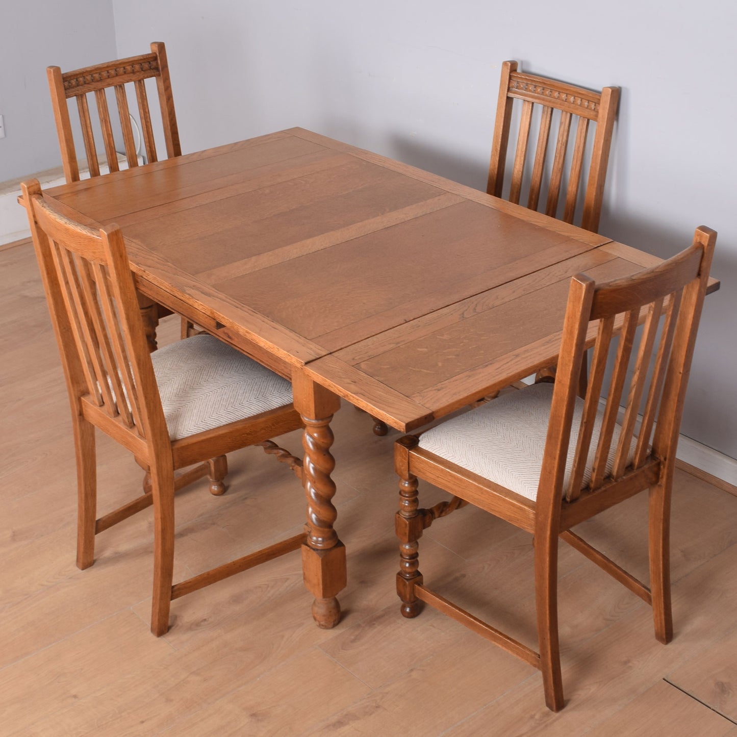 Draw-Leaf Dining Table with Four Chairs