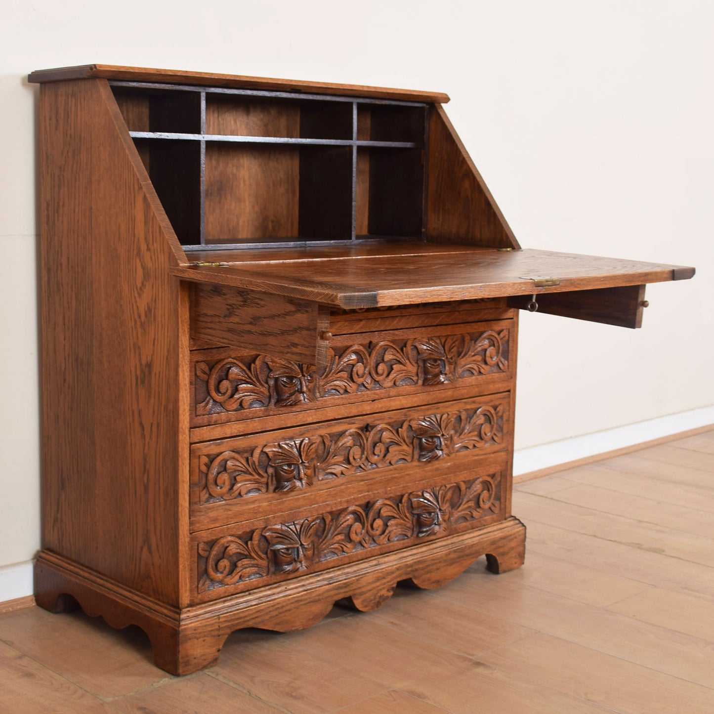 Ornately Carved Oak Greenman Bureau