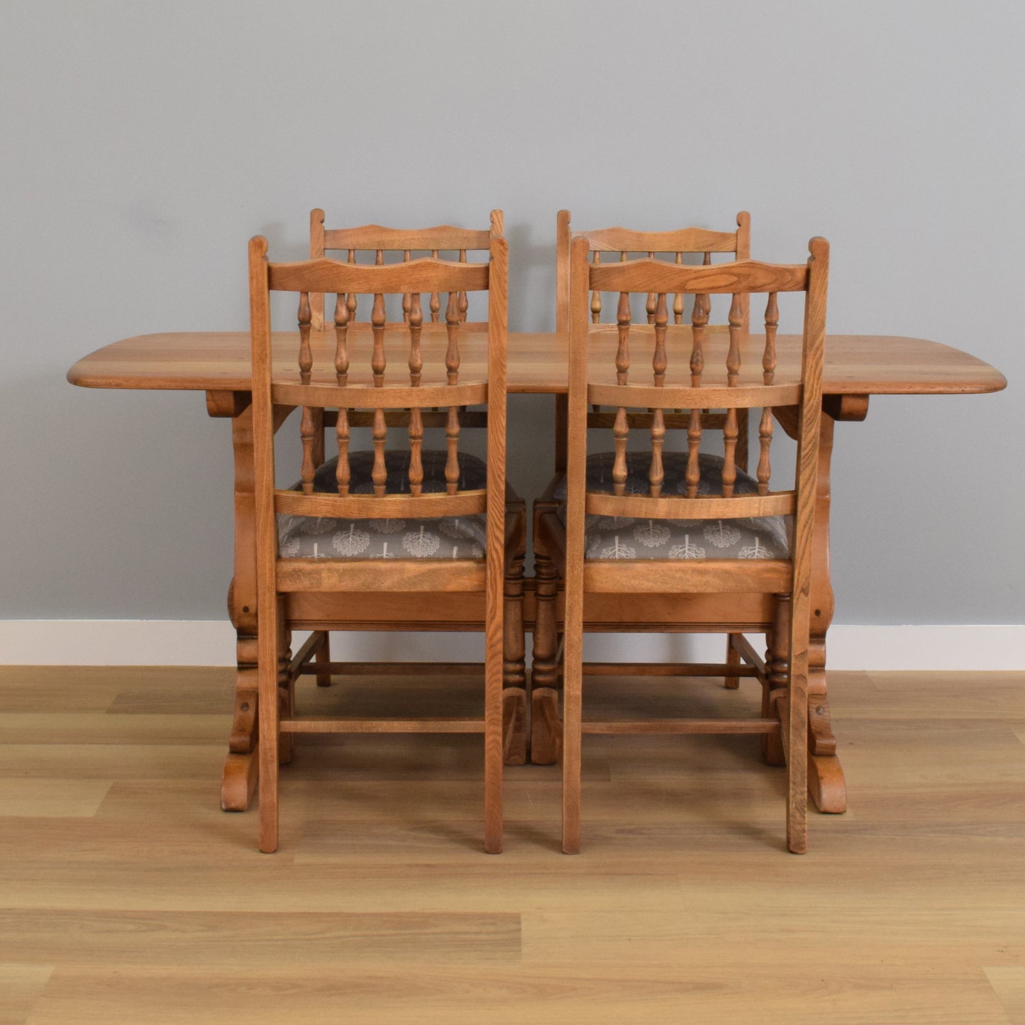 Ercol Trestle Table and Four 'Old Colonial' Chairs