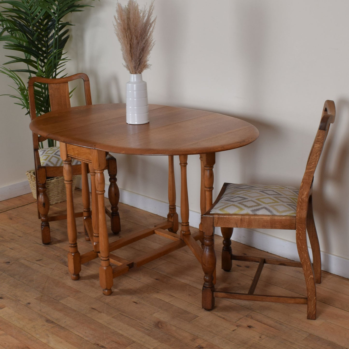 Oak Drop Leaf Table and Two Chairs