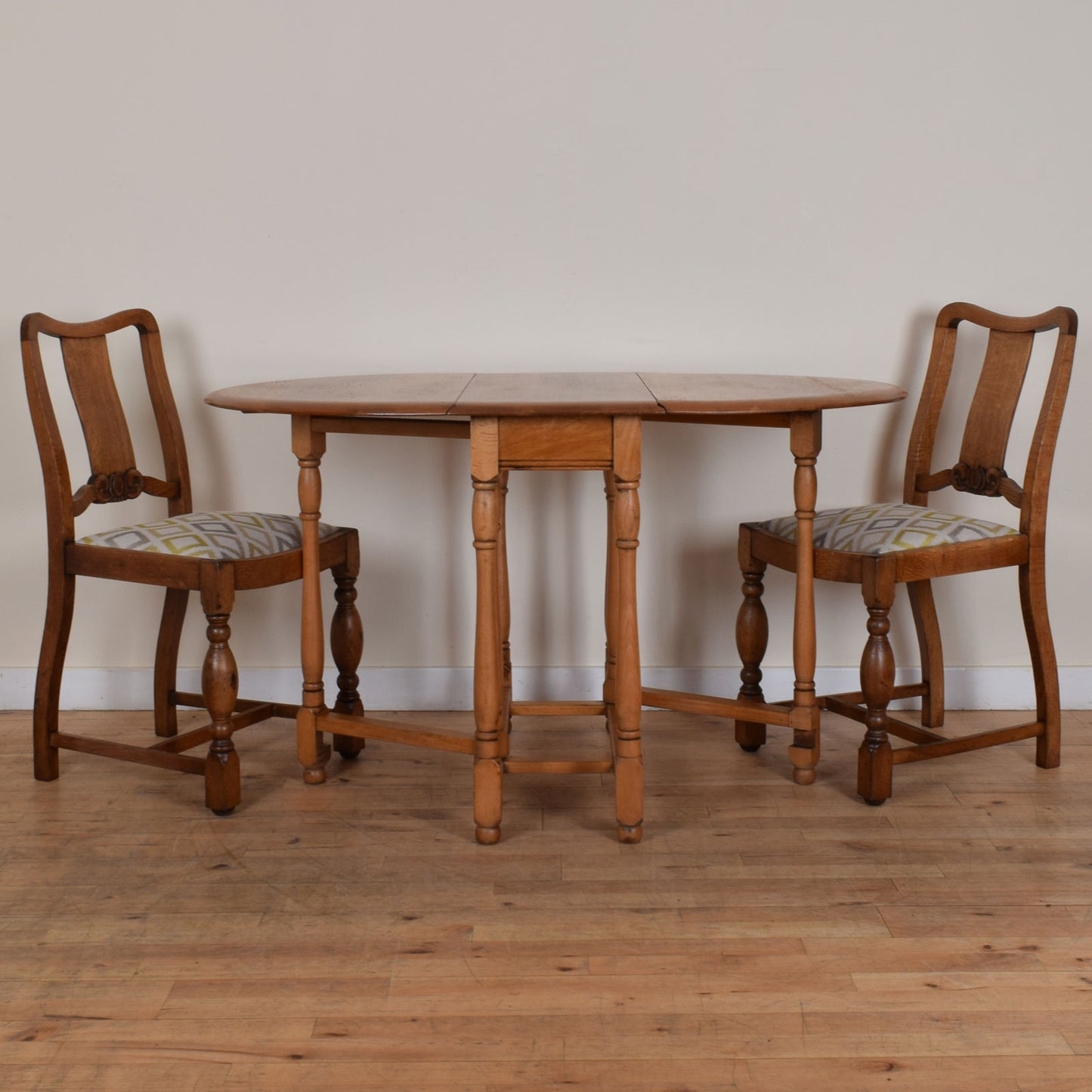 Oak Drop Leaf Table and Two Chairs