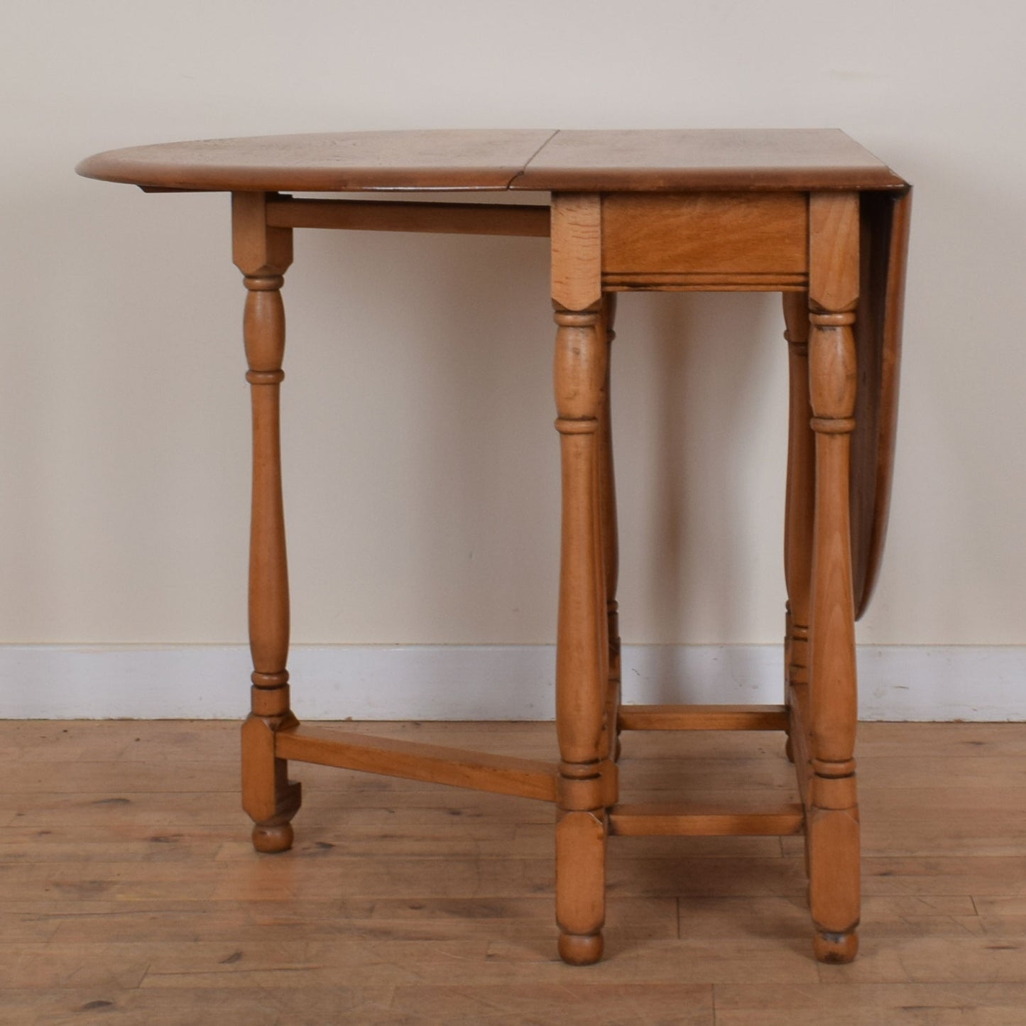 Oak Drop Leaf Table and Two Chairs