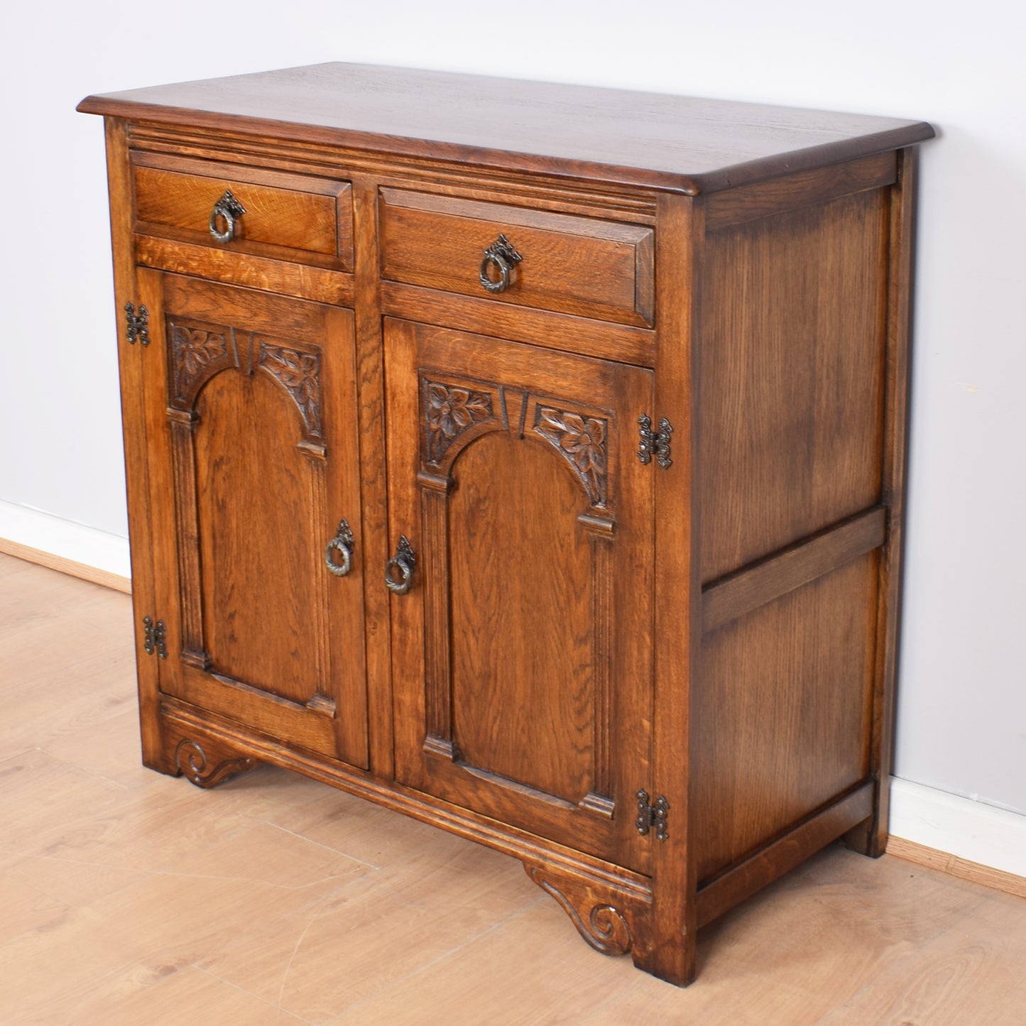 Carved Oak Two-Door Sideboard