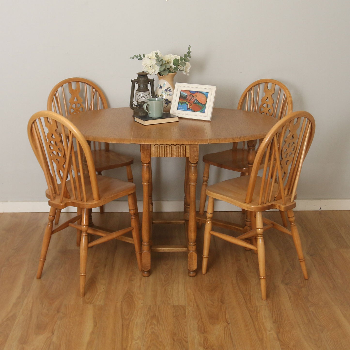 Drop-Leaf Table And Four Wheelback Chairs