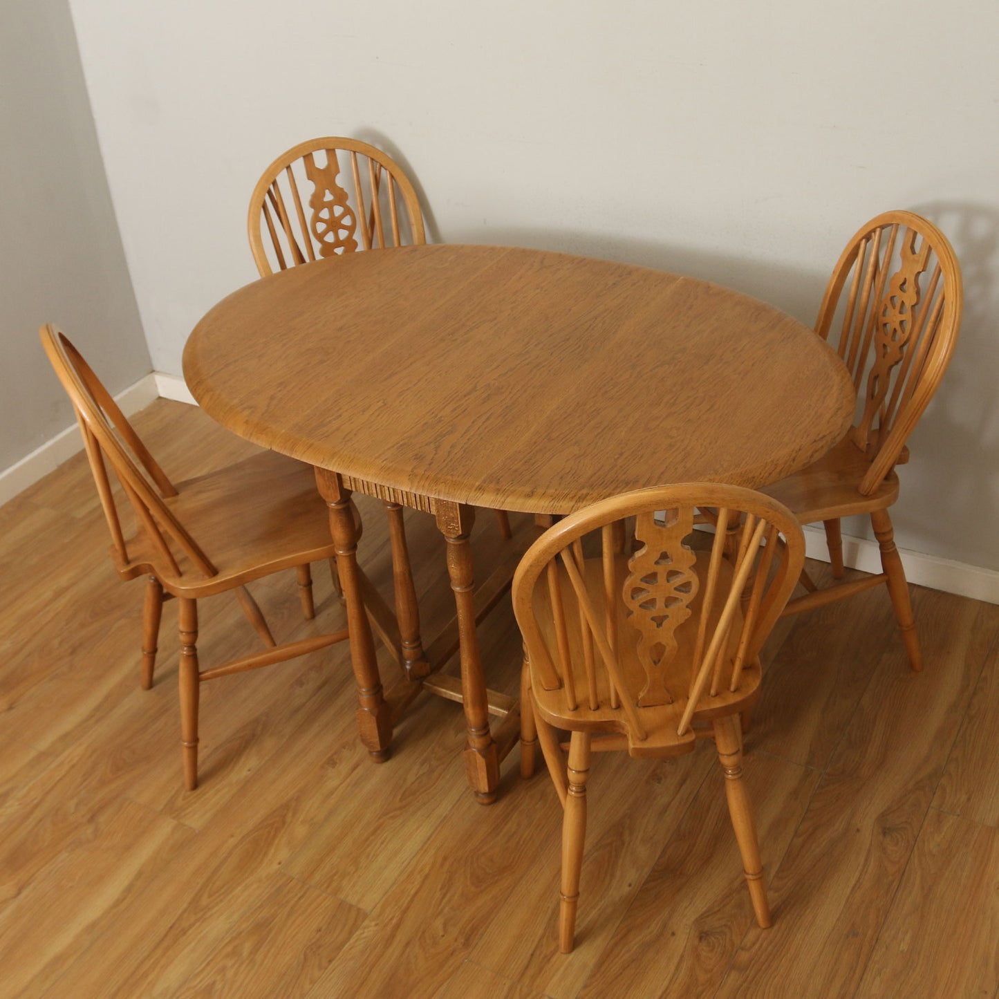 Drop-Leaf Table And Four Wheelback Chairs