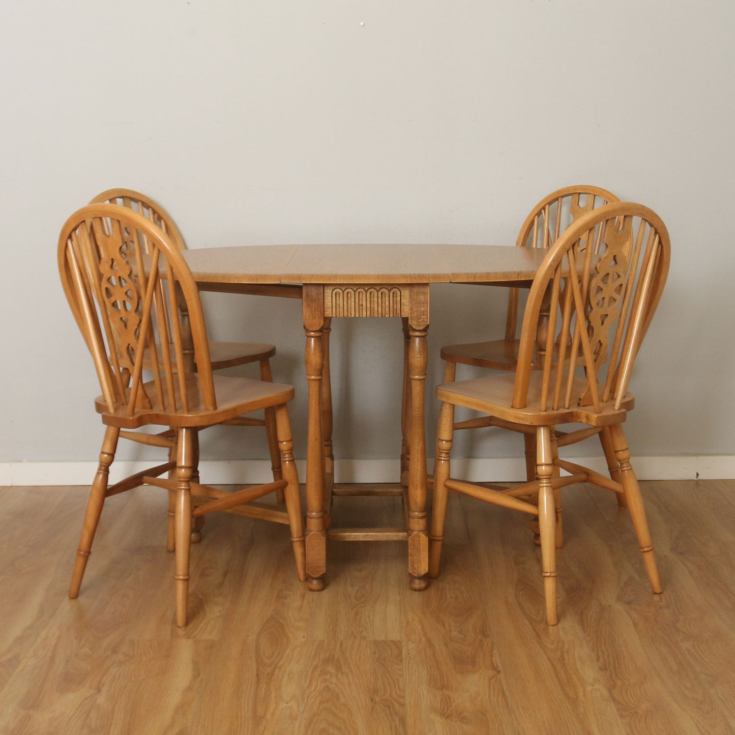 Drop-Leaf Table And Four Wheelback Chairs