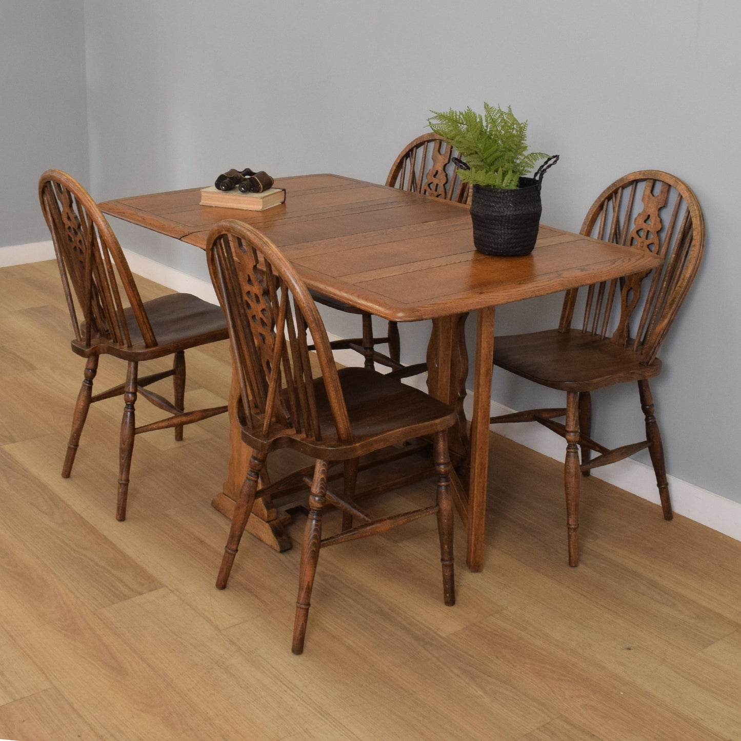 Drop-Leaf Table with Four Wheel-Back Chairs