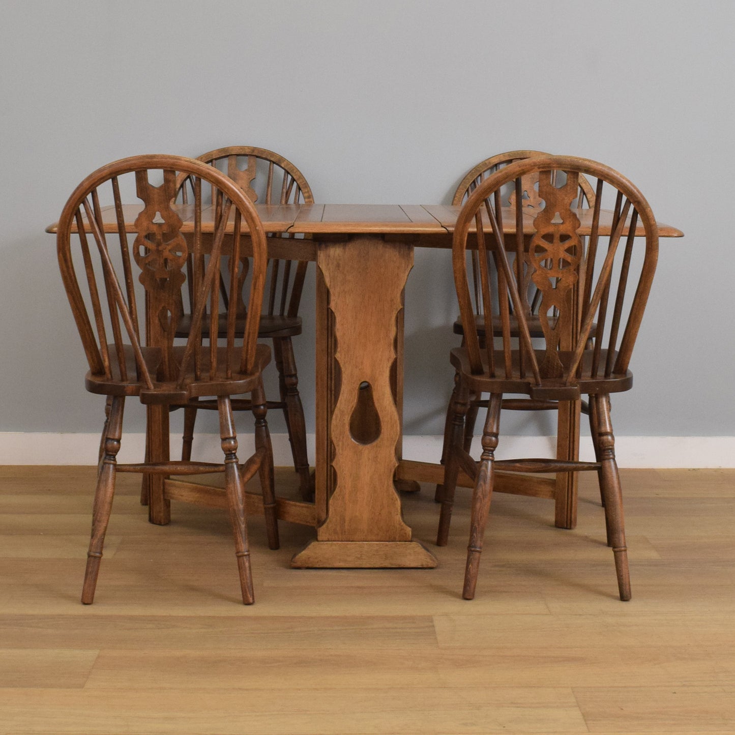 Drop-Leaf Table with Four Wheel-Back Chairs