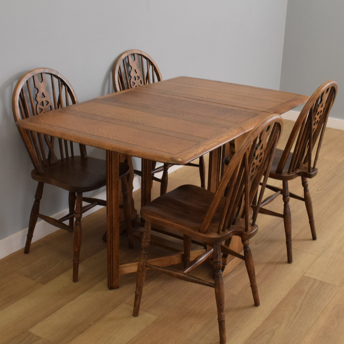 Drop-Leaf Table with Four Wheel-Back Chairs