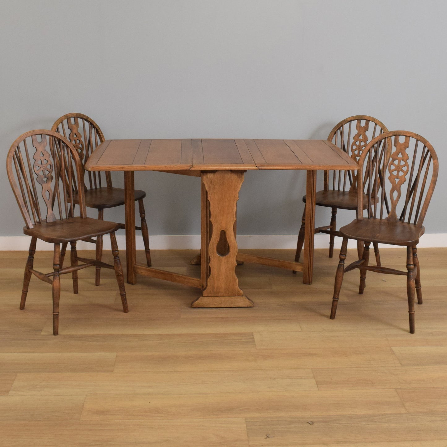 Drop-Leaf Table with Four Wheel-Back Chairs