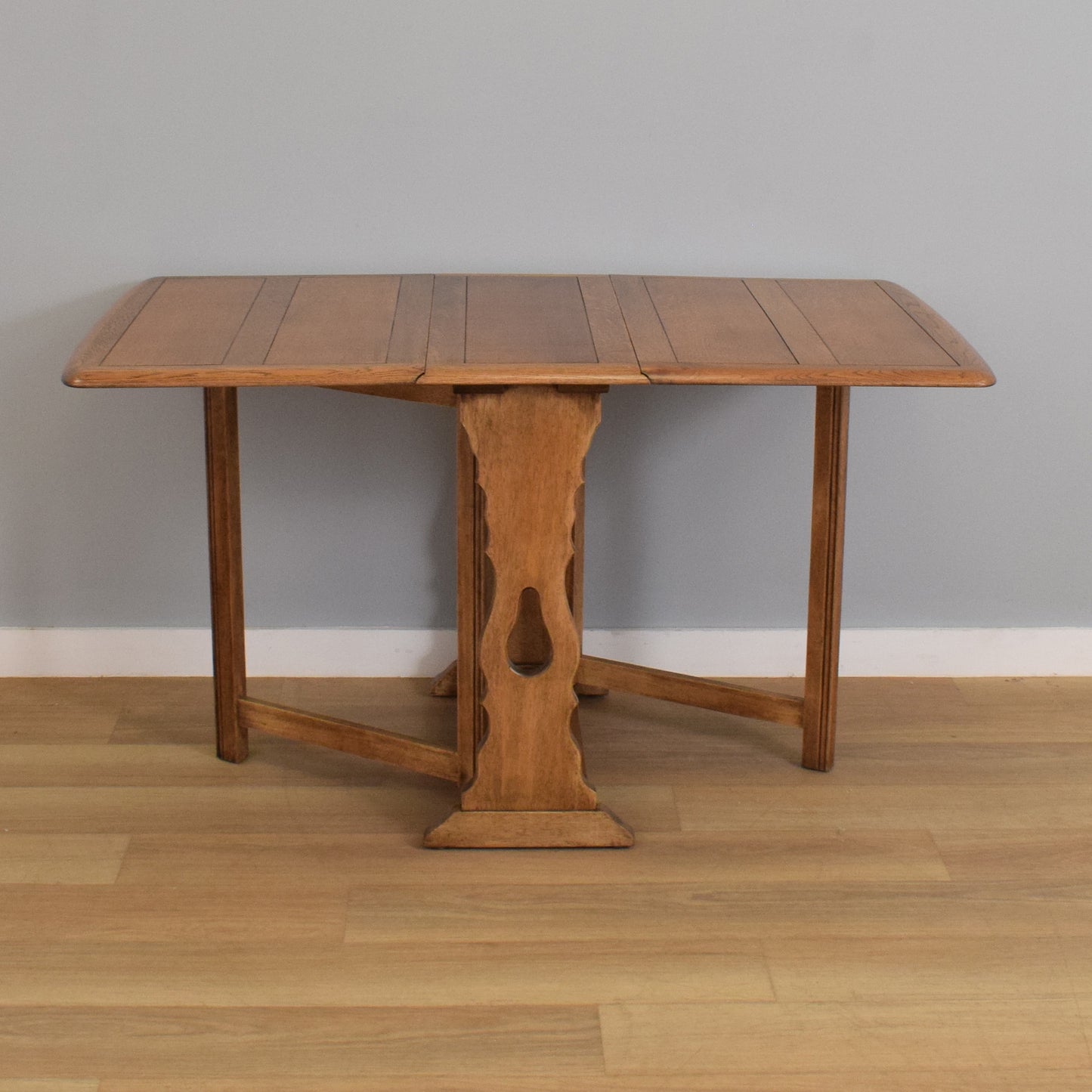 Drop-Leaf Table with Four Wheel-Back Chairs