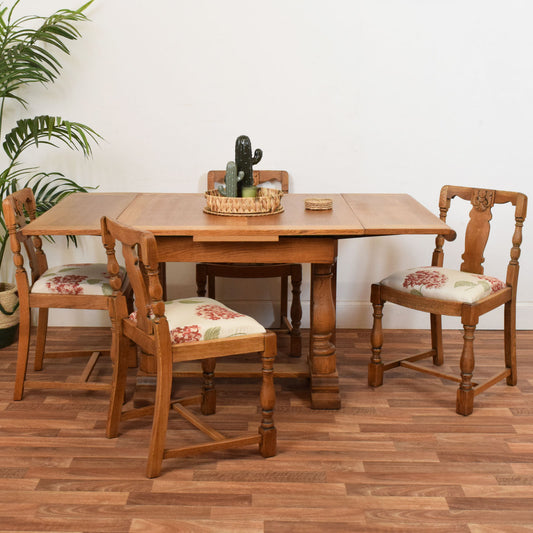 Carved Oak Draw Leaf Table and Four Chairs