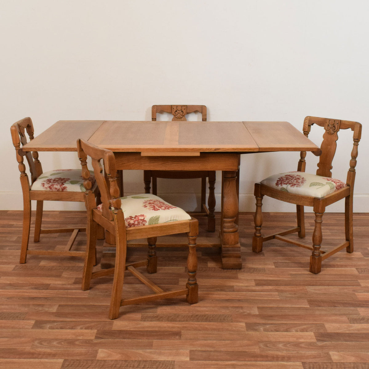 Carved Oak Draw Leaf Table and Four Chairs