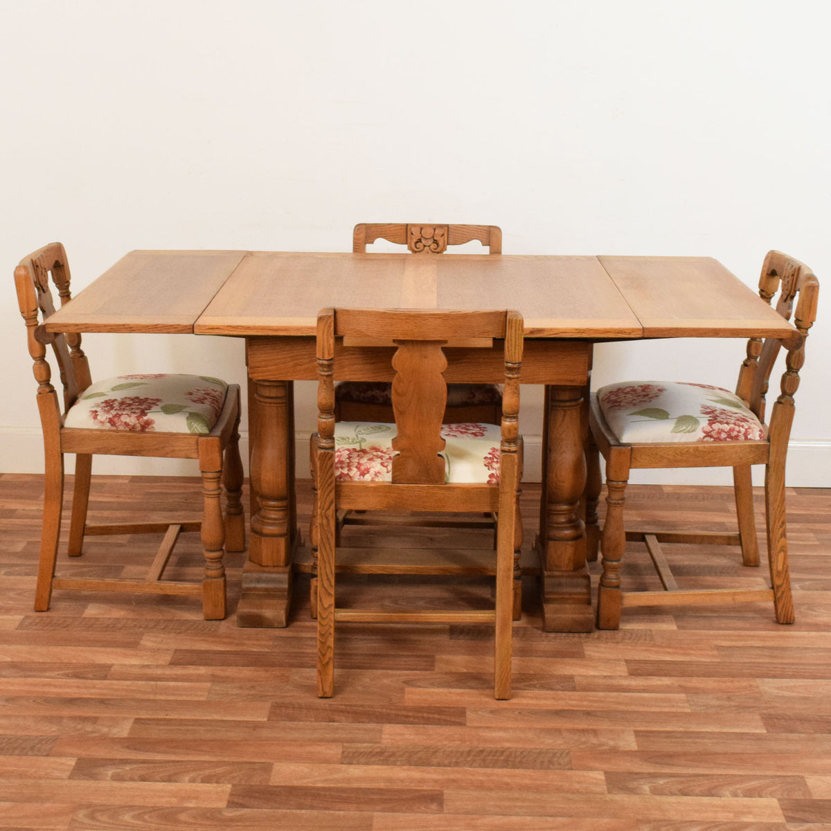 Carved Oak Draw Leaf Table and Four Chairs