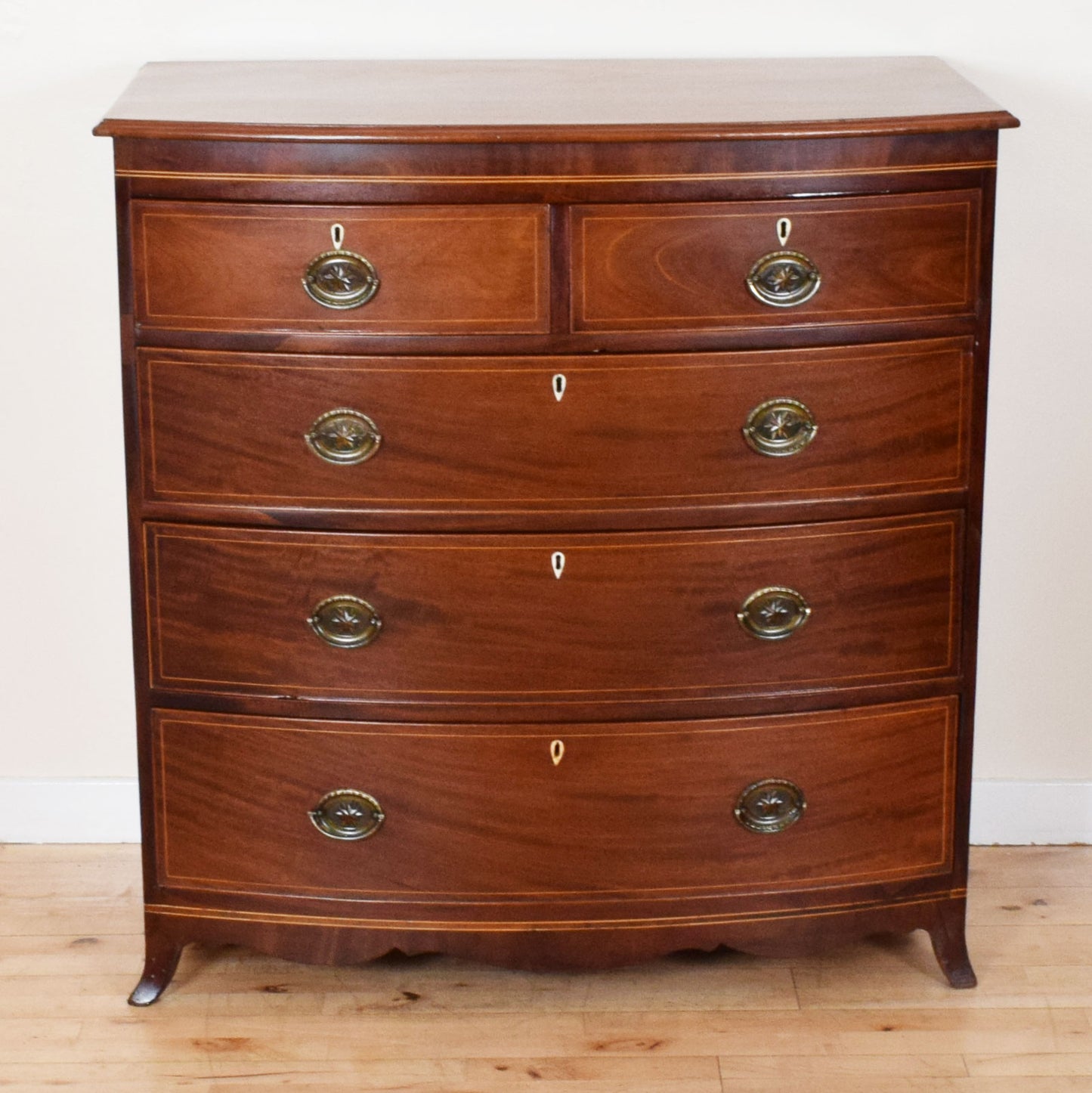 Inlaid Bow-Fronted Chest of Drawers