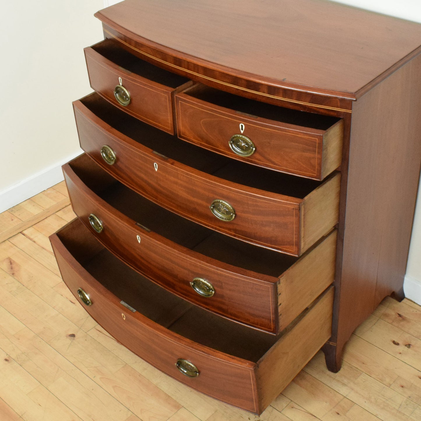 Inlaid Bow-Fronted Chest of Drawers