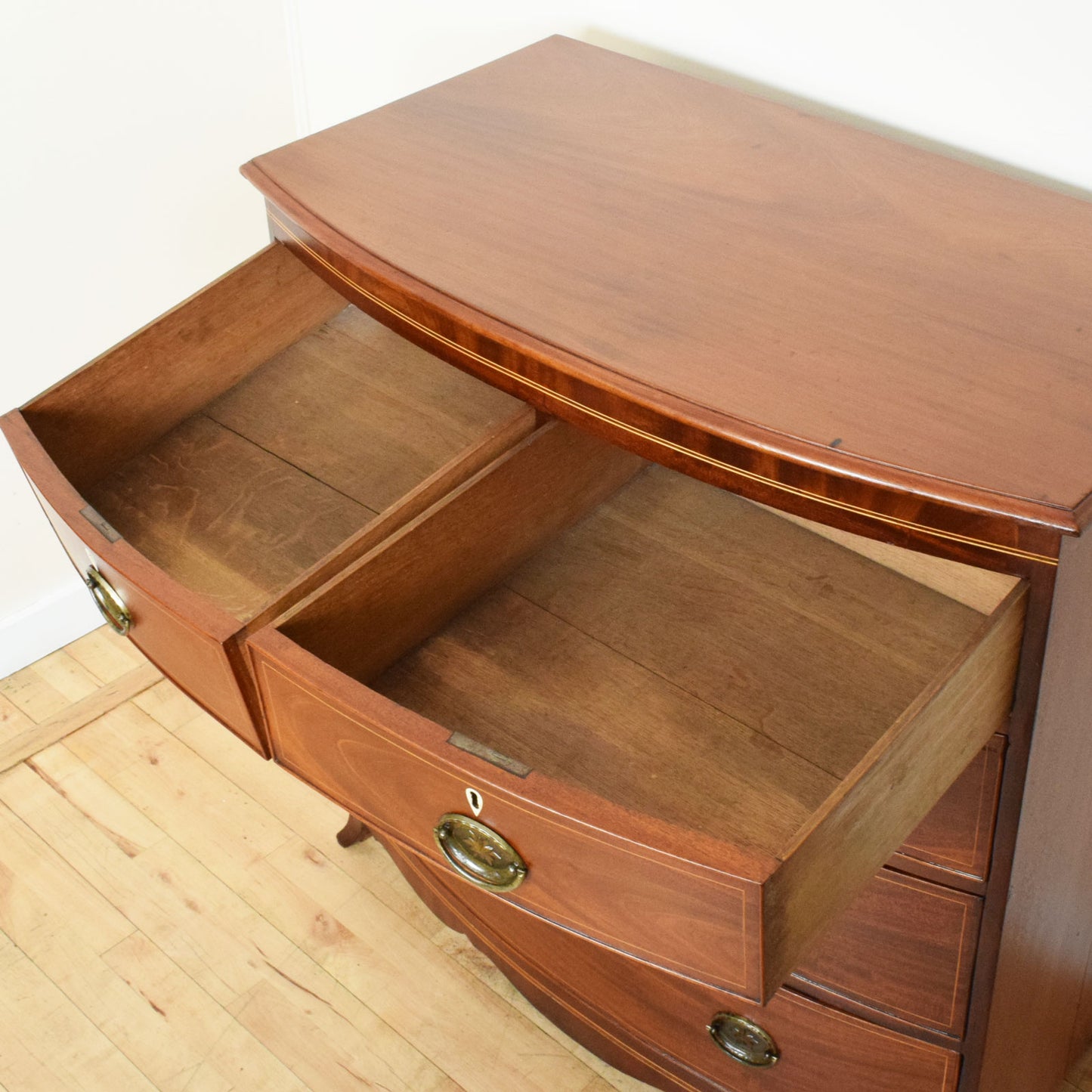 Inlaid Bow-Fronted Chest of Drawers