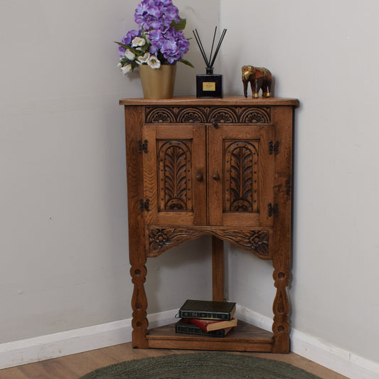 Carved Oak Corner Cabinet