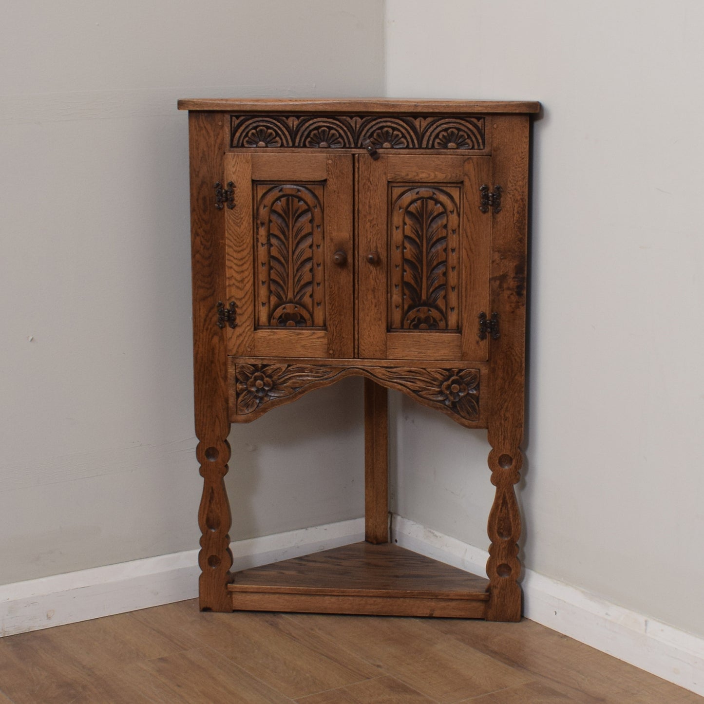 Carved Oak Corner Cabinet