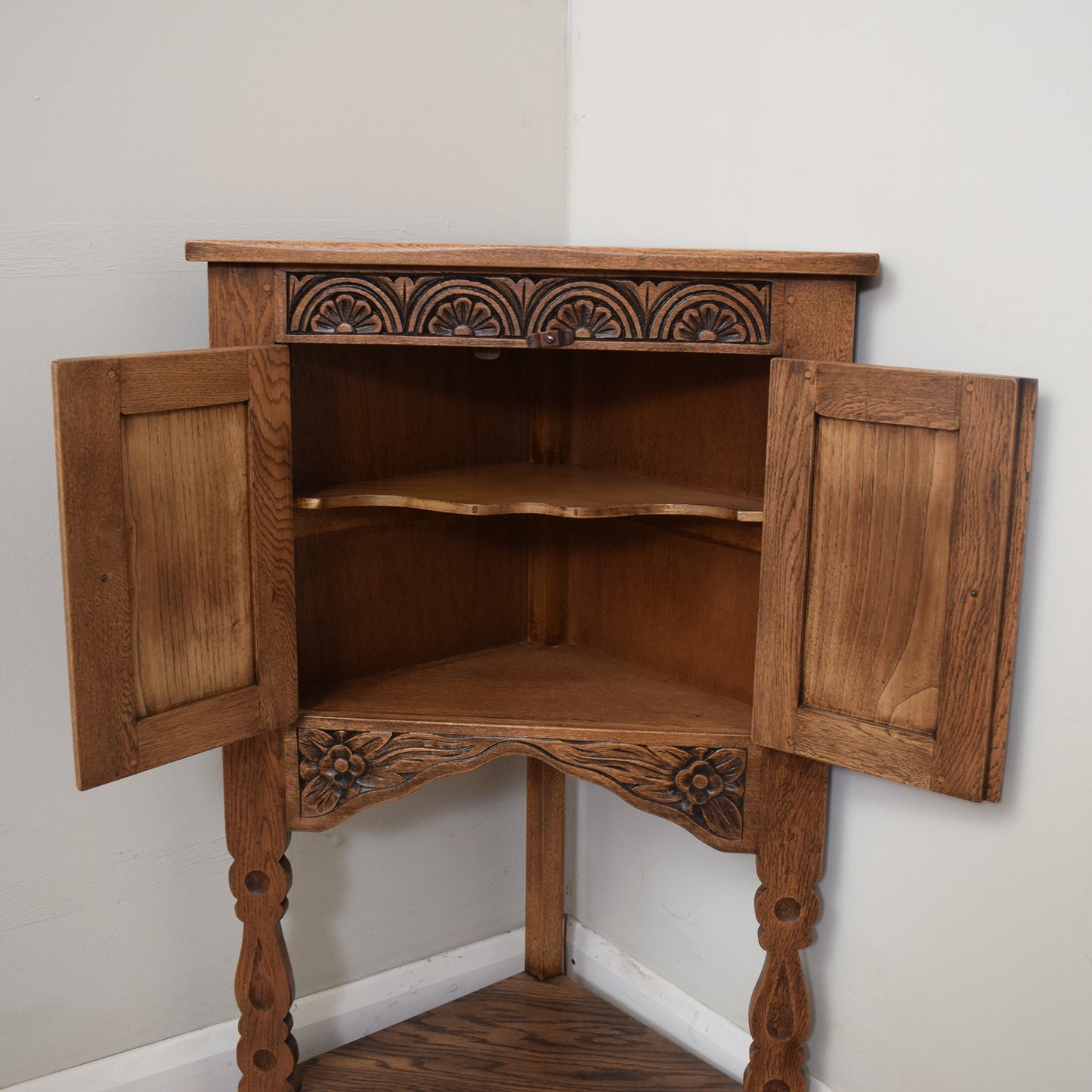 Carved Oak Corner Cabinet