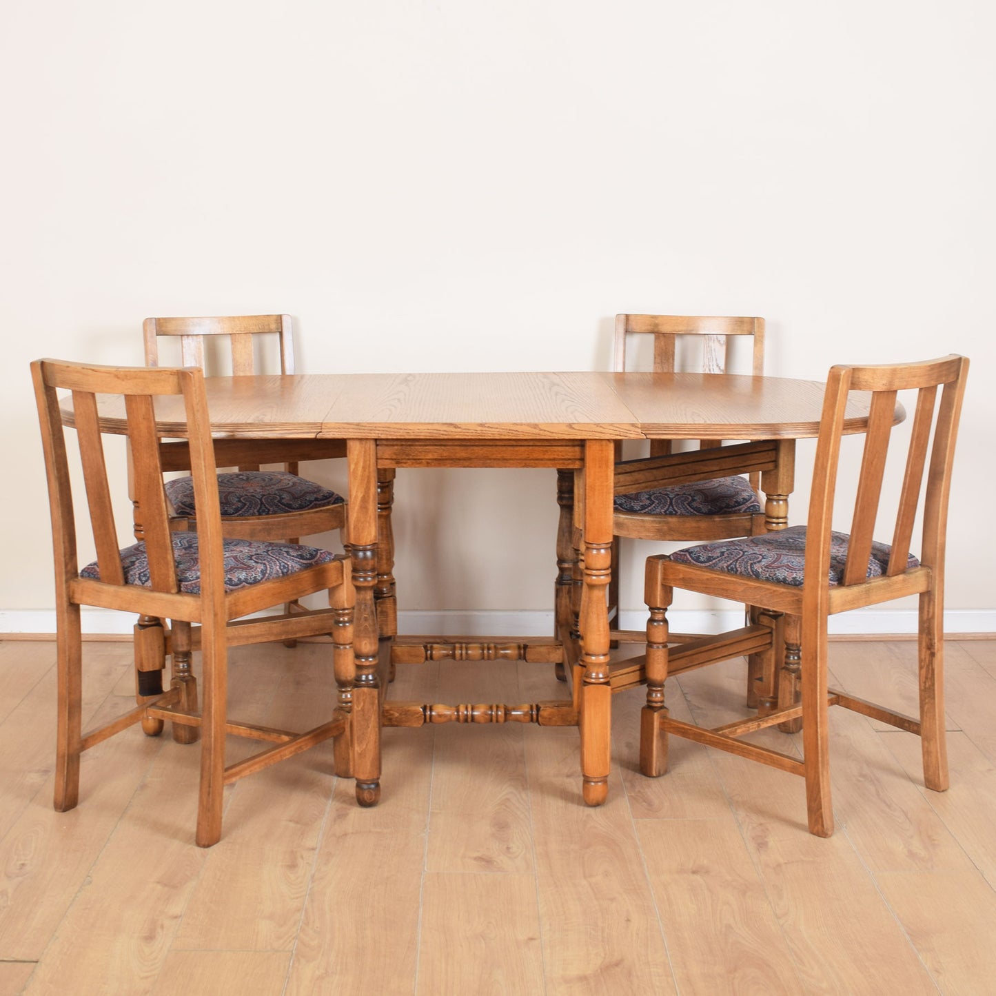 Oak Drop-Leaf Table with Four Chairs