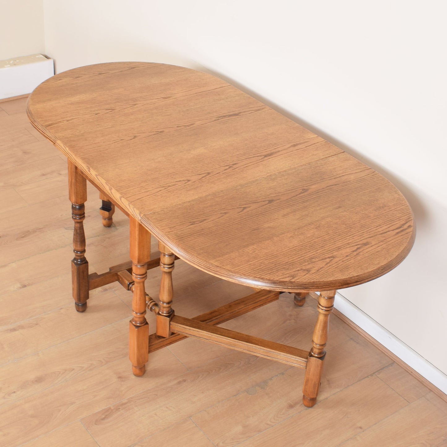 Oak Drop-Leaf Table with Four Chairs