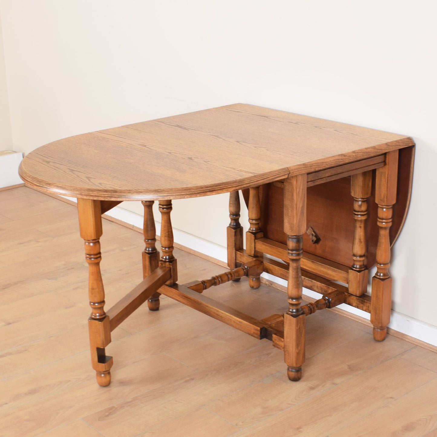 Oak Drop-Leaf Table with Four Chairs
