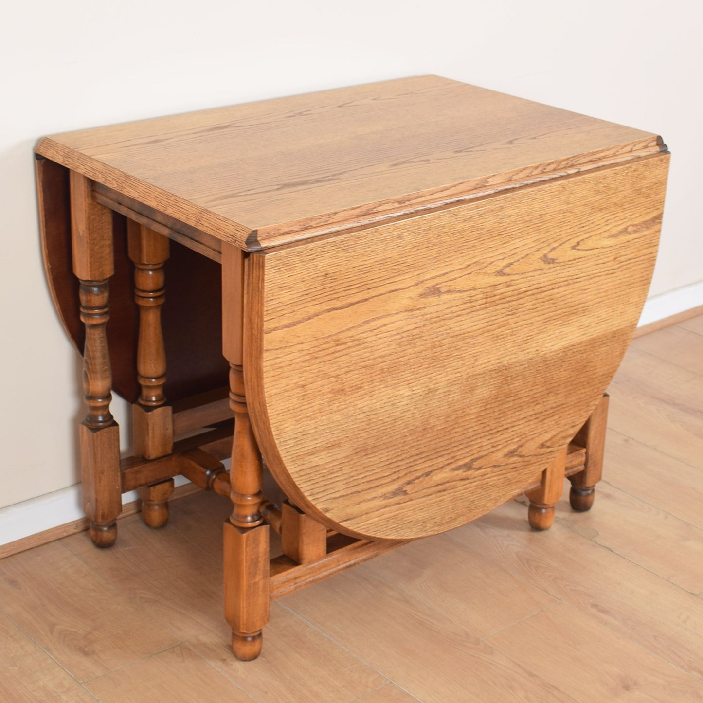 Oak Drop-Leaf Table with Four Chairs