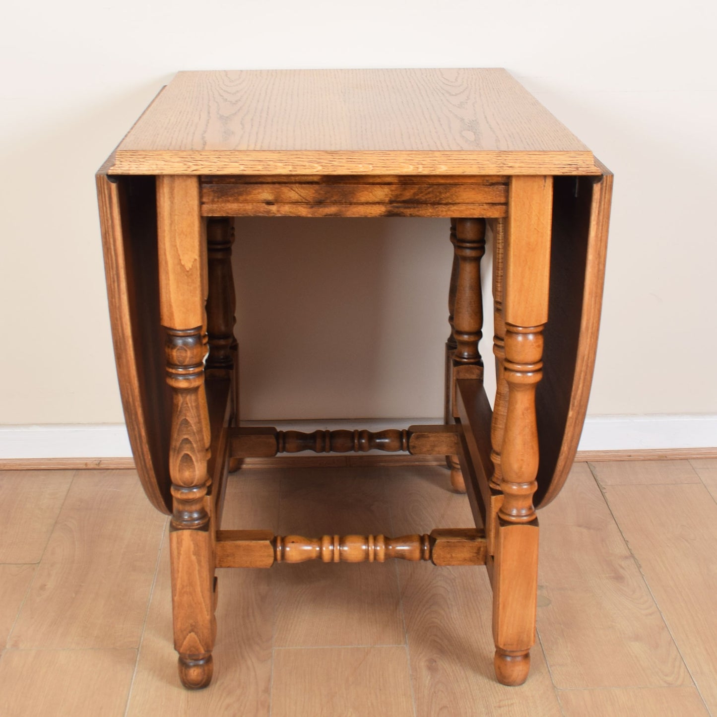Oak Drop-Leaf Table with Four Chairs