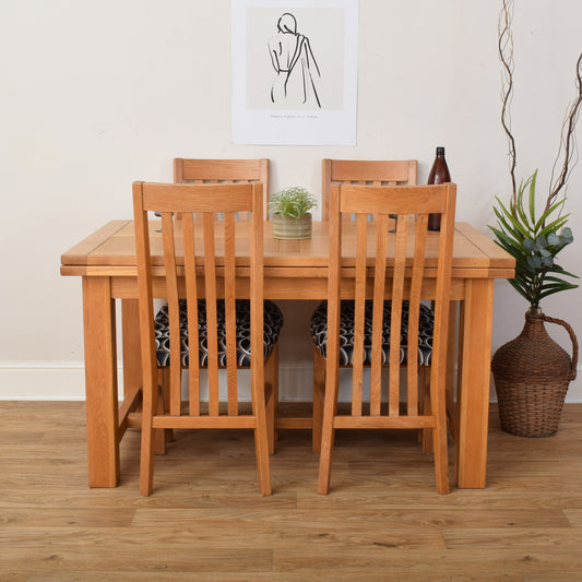 Draw Leaf Table And Four Chairs
