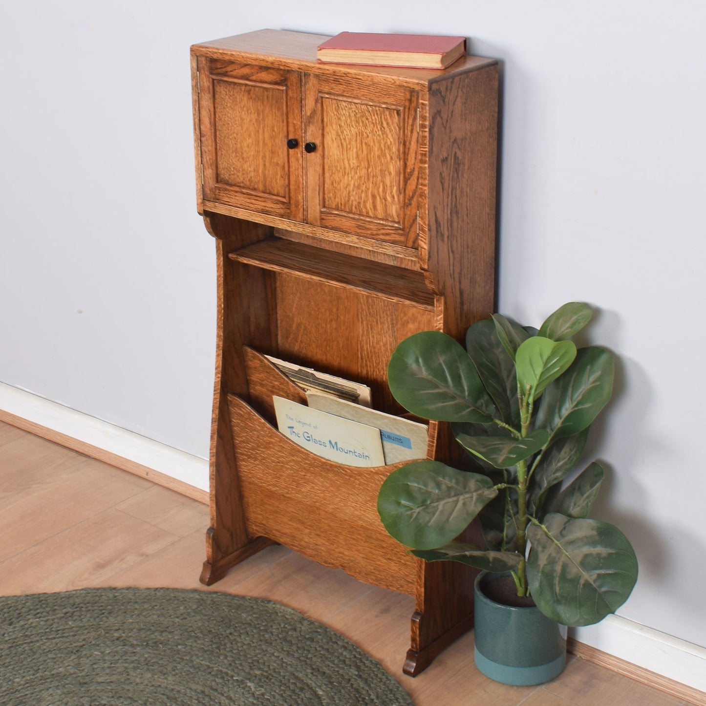 Unusual Cabinet with Magazine Rack