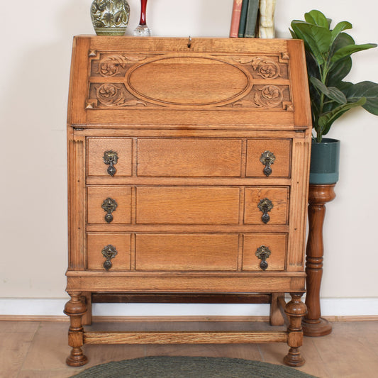 Ornate Carved Oak Bureau