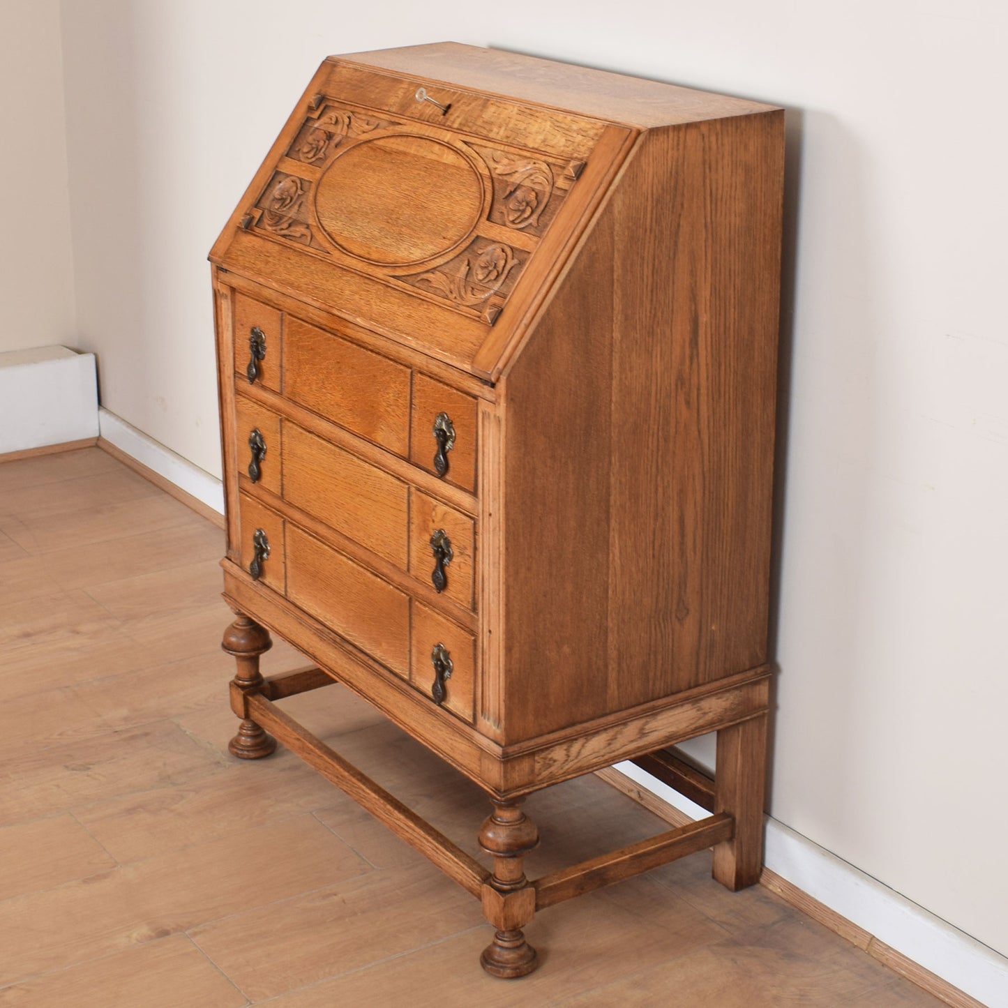 Ornate Carved Oak Bureau