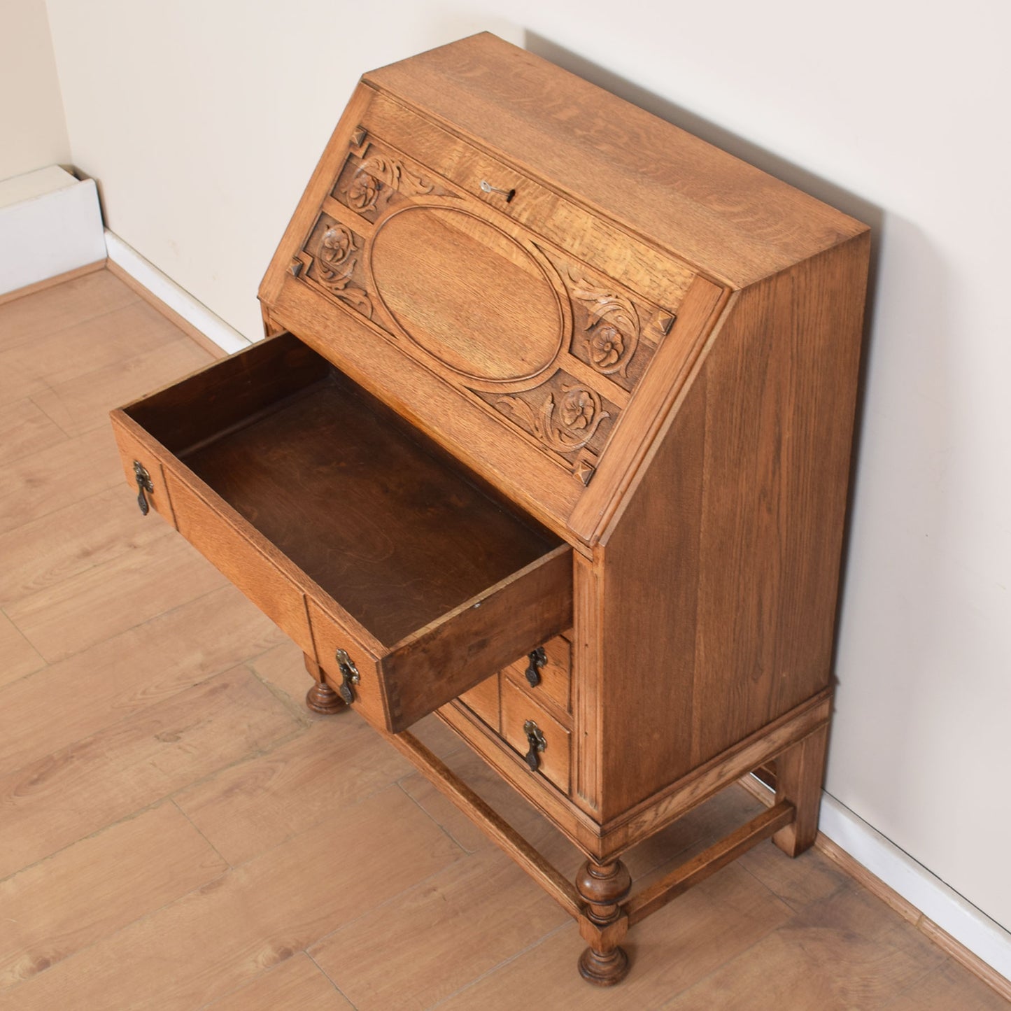 Ornate Carved Oak Bureau