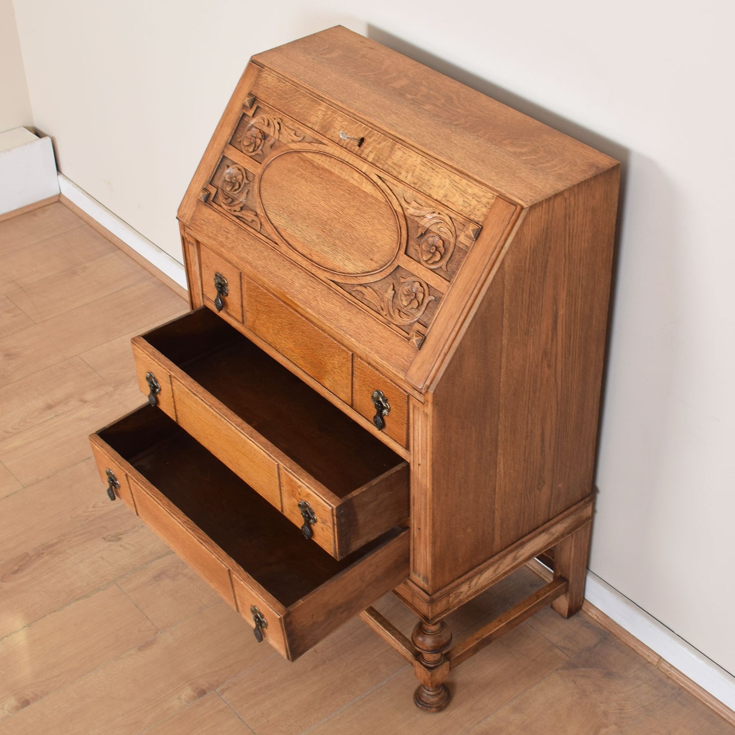 Ornate Carved Oak Bureau