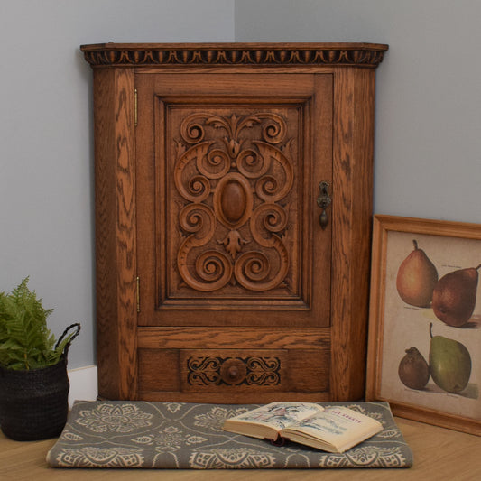 Carved Oak Corner Cabinet