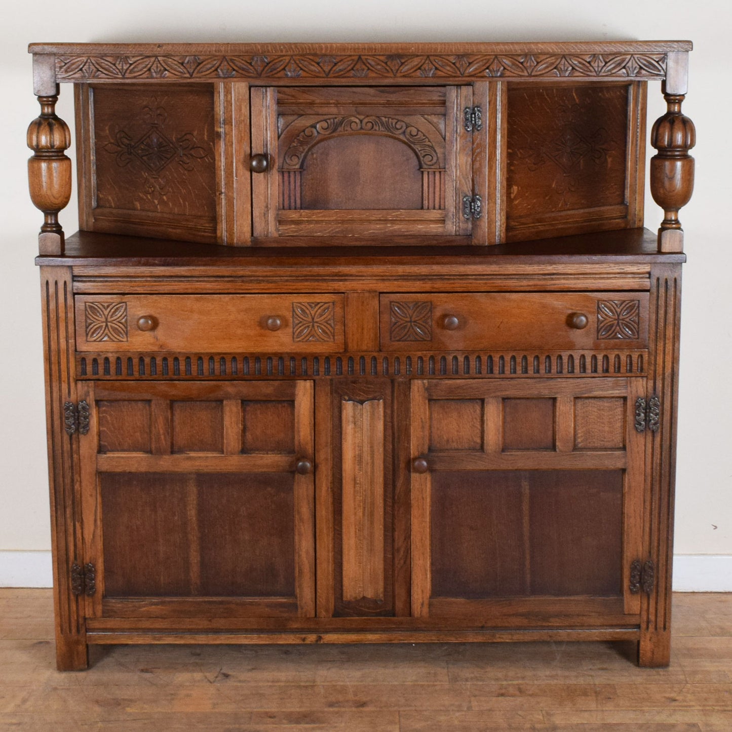 Carved Court Cabinet