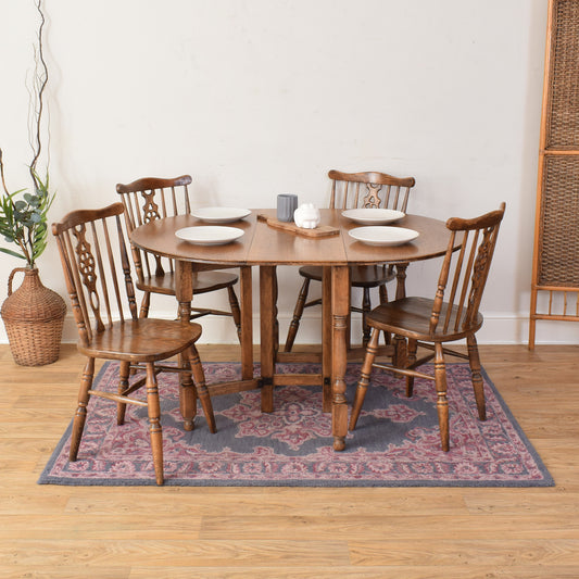 Oak Table And Four Chairs