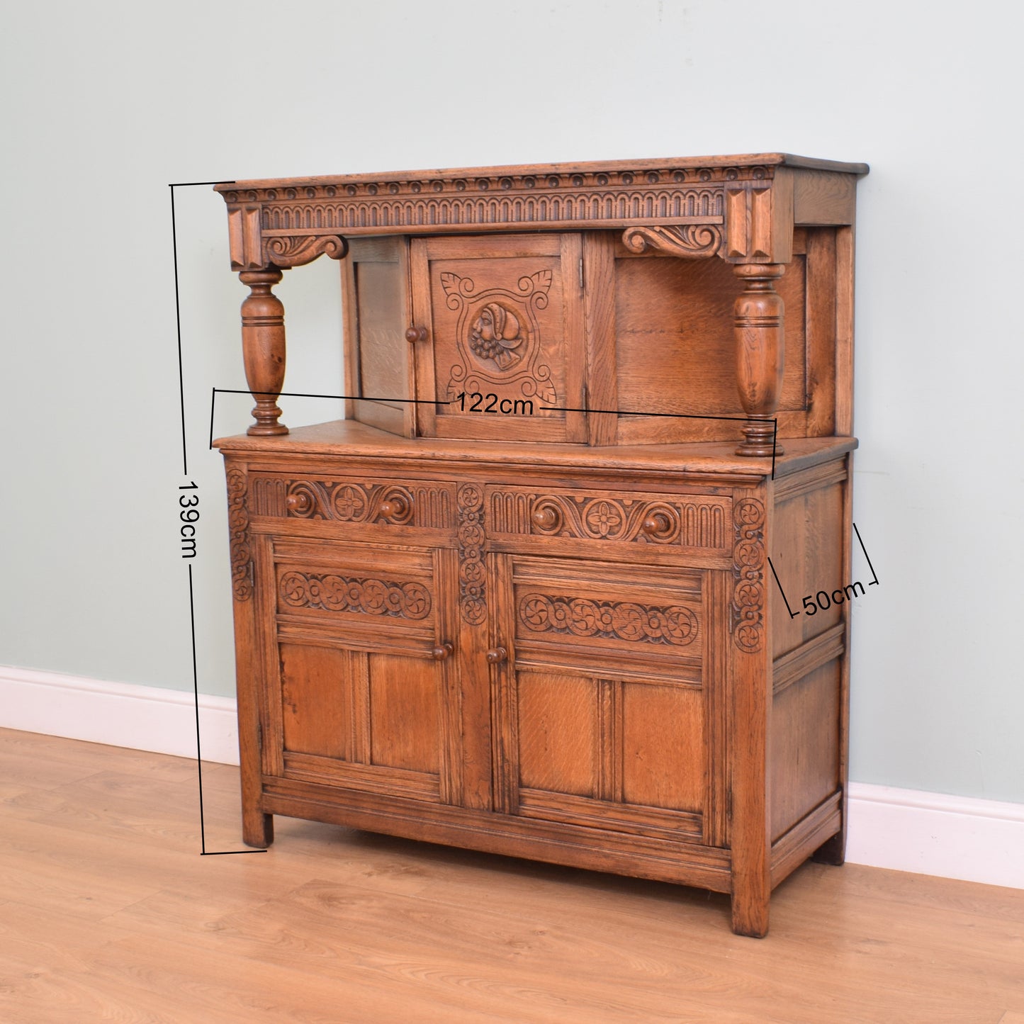 Carved Oak Court Cabinet
