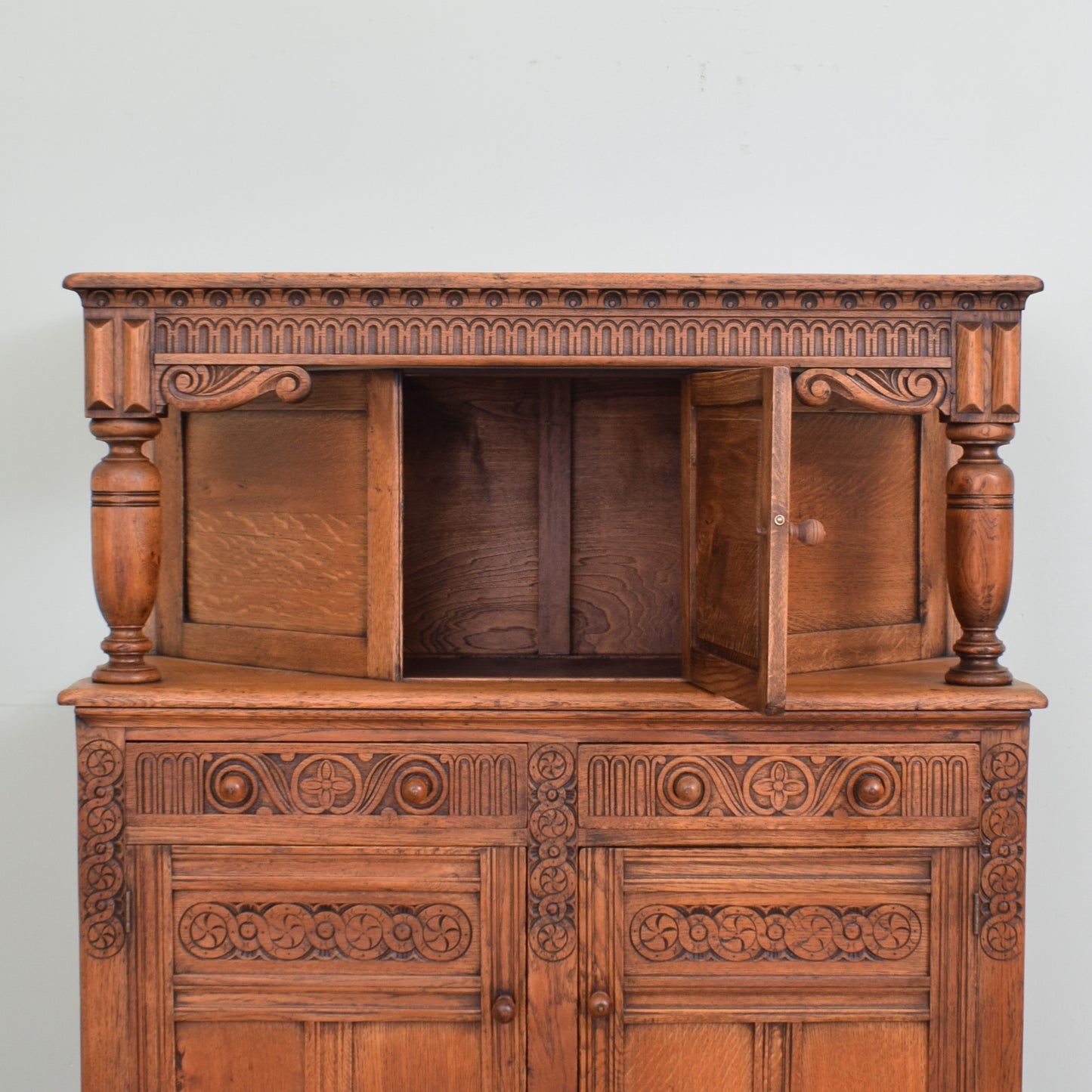 Carved Oak Court Cabinet