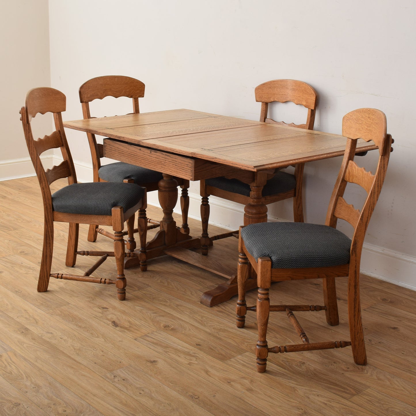 Extendable Table And Four Chairs