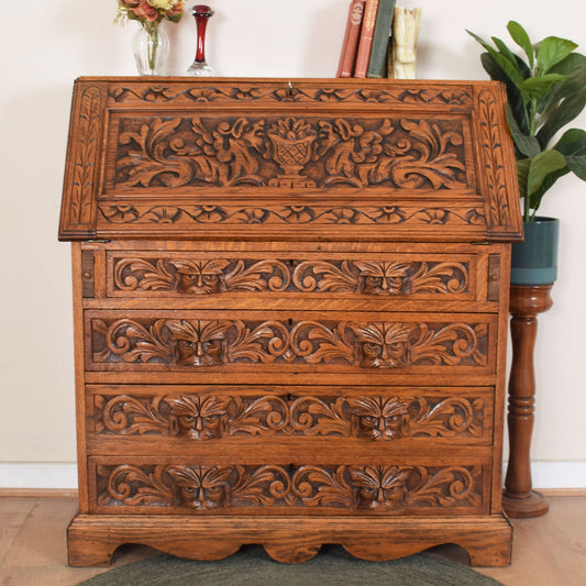 Ornately Carved Oak Greenman Bureau